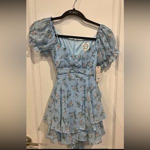 Francesca’s new with tags Romper with puff sleeves